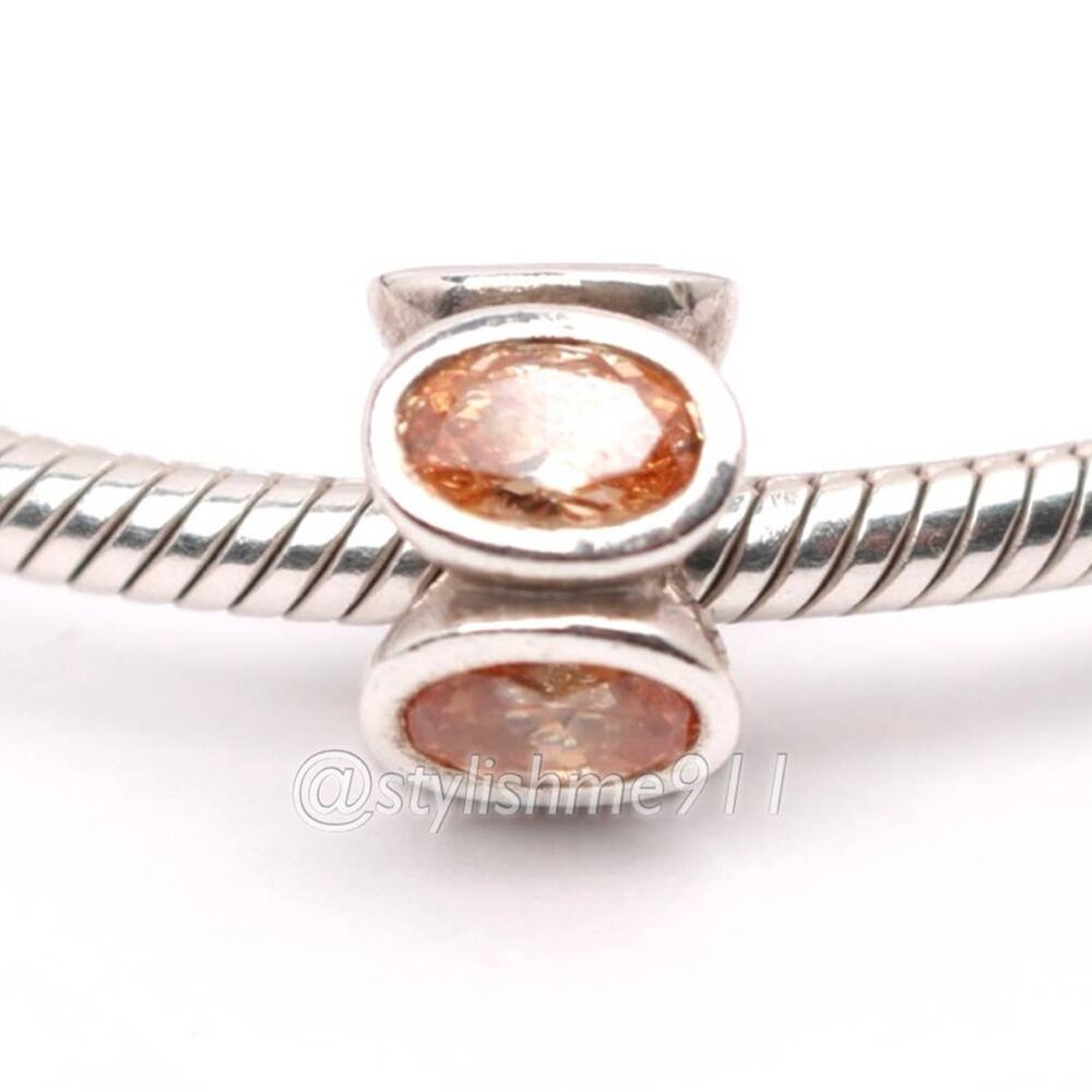 Authentic PANDORA Retired Champagne Oval Lights Charm